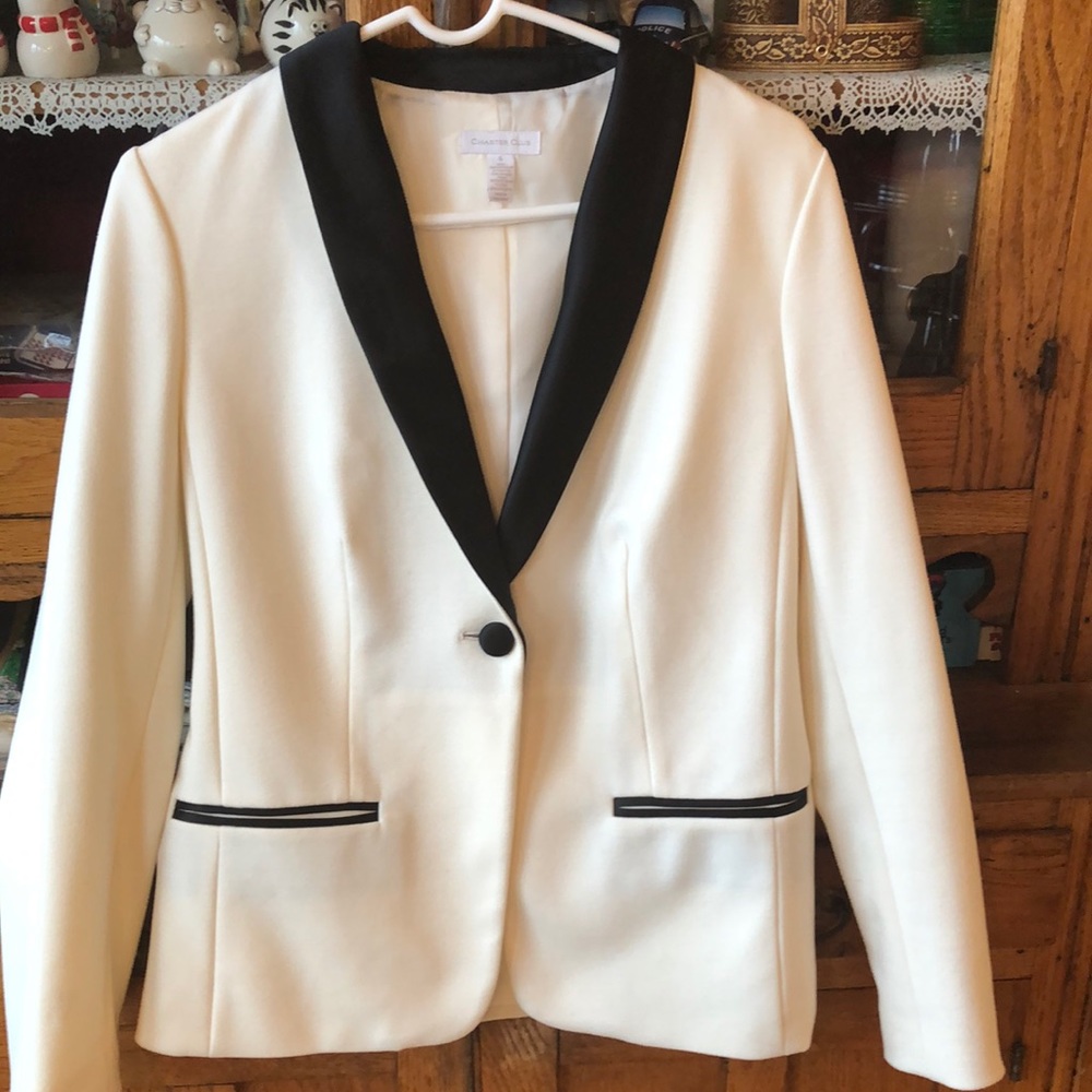 Tuxedo jacket. Fully lined. Black satin collar. Machine wash cold.